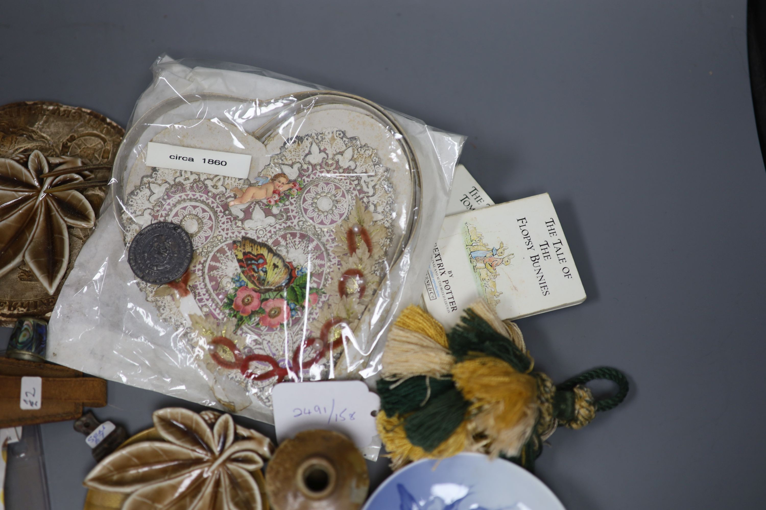 A 19th century valentine card, six pence pieces and mixed collectables